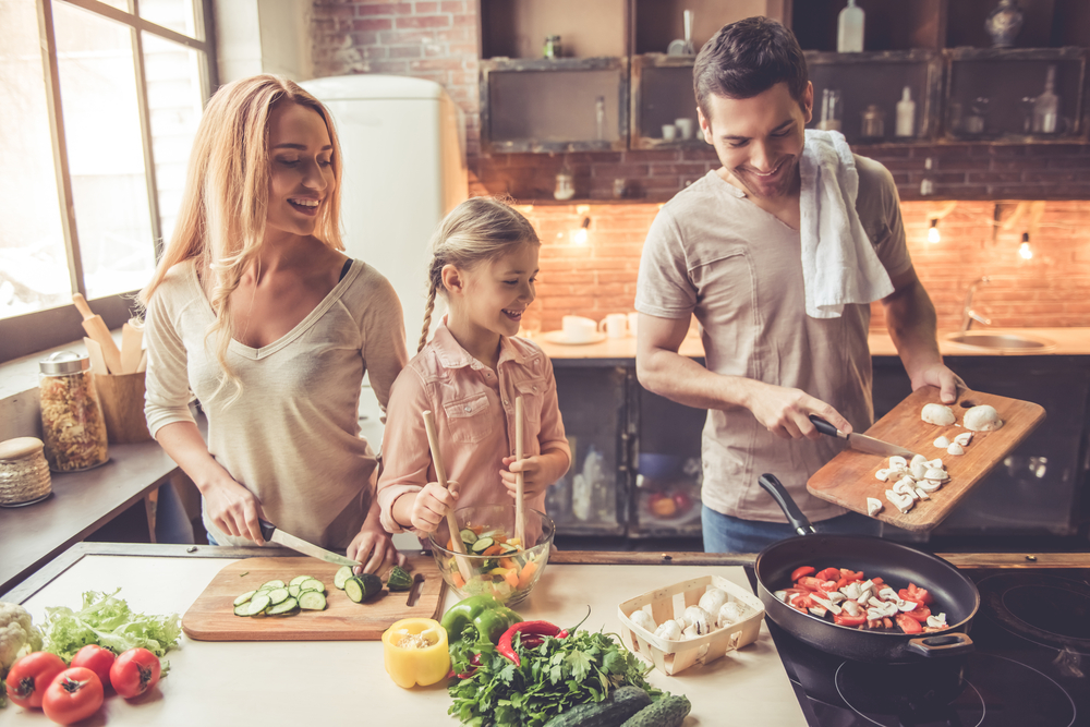 Displaying the power of food, a family is brought together in preparing a healthy meal.